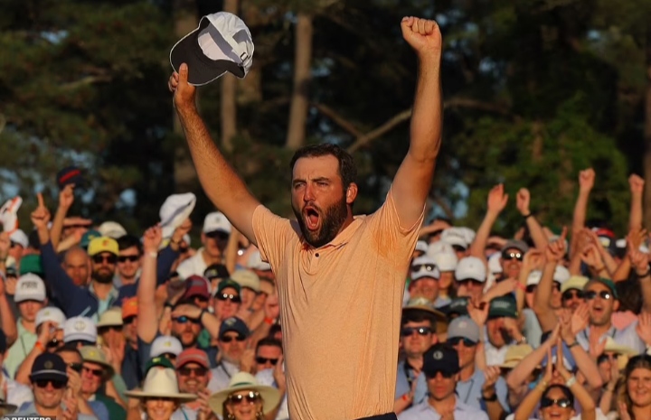 Emotional Scottie Scheffler clinches second Masters title on chaotic final day at Augusta