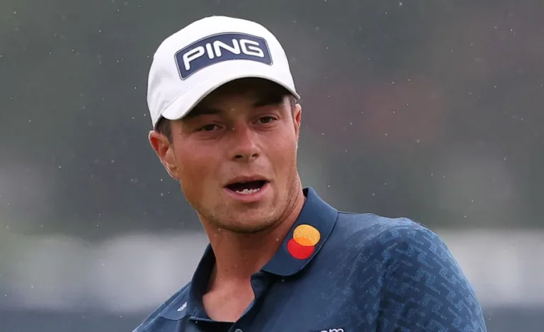 Viktor Hovland withdraws in group with Scottie Scheffler during final round of Travelers Championship.